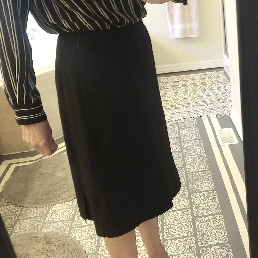 Ann Taylor Black A-Line Skirt w/unique kick pleats around bottom of skirt